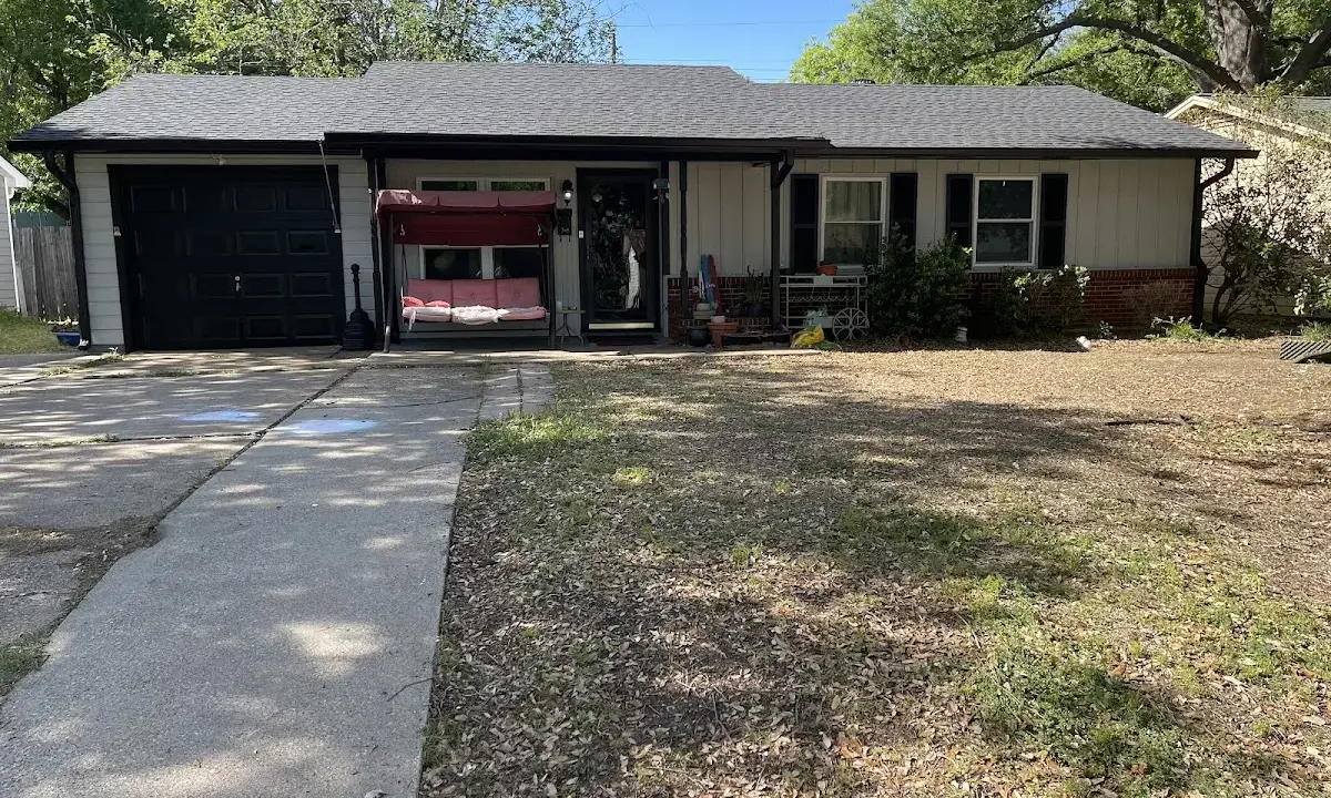 Asphalt Shingle Roof Repair crew at work on a residential roof in West Livingston